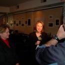 Reporter interviewing Mayor Foster